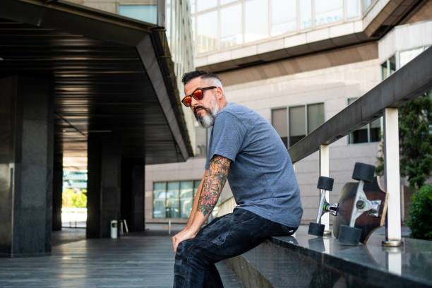 istock Skater with a tattoo resting 1168010769