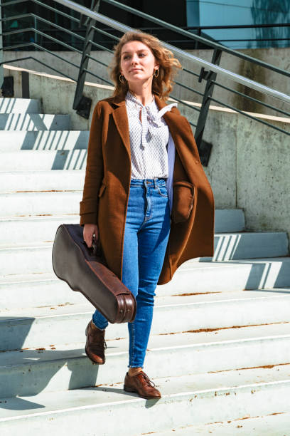 istock Girl with violin came down stairs after lessons 1168014011