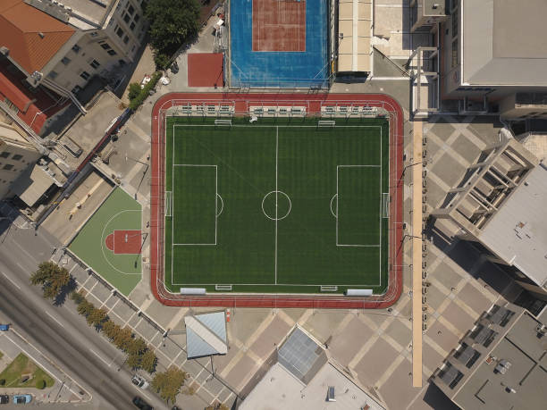 istock Real soccer field - Top down aerial view. shooting from drone 1168014012