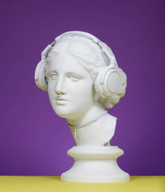 modern greek goddess with headphones - classical greek audio imagens e fotografias de stock