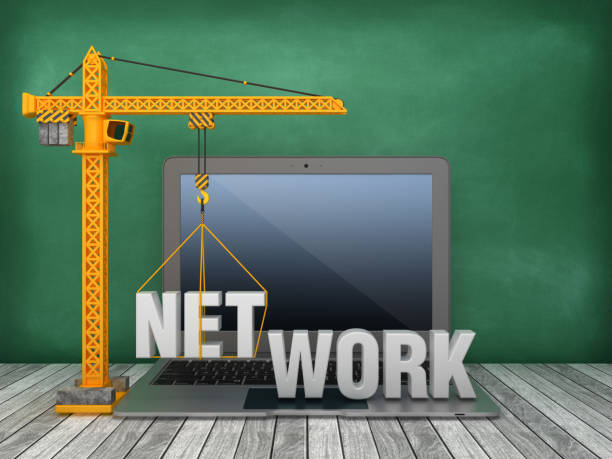istock Tower Crane and Laptop with NETWORK Word on Chalkboard Background - 3D Rendering 1168016443