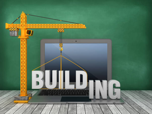 istock Tower Crane and Laptop with BUILDING Word on Chalkboard Background - 3D Rendering 1168016460