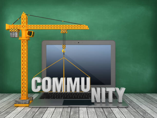 istock Tower Crane and Laptop with COMMUNITY Word on Chalkboard Background - 3D Rendering 1168016463