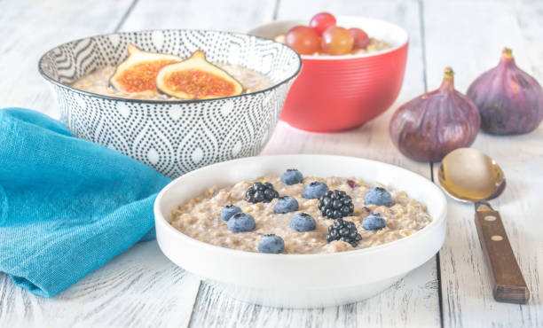istock Three bowls of oatmeal 1168022151