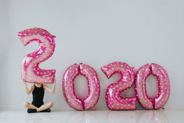 istock Cute girl carry balloon with new year 2020 concept 1168024407