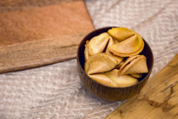 istock fresh cookies with a prediction lying on a wooden 1168031790