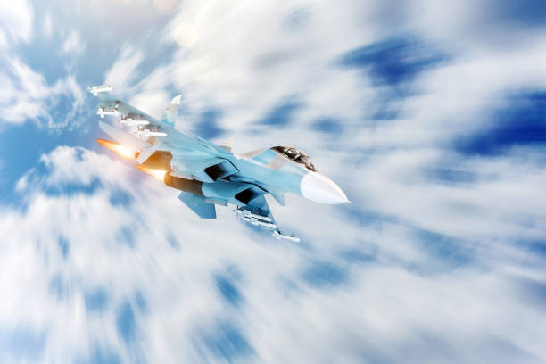 istock Fighter jet maneuver with afterburner in the sky. Conflict, war. Aerospace forces. 1168033801