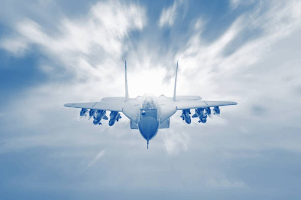 istock Fighter jet maneuver with afterburner in the sky. Conflict, war. Aerospace forces, monochrome color 1168033868