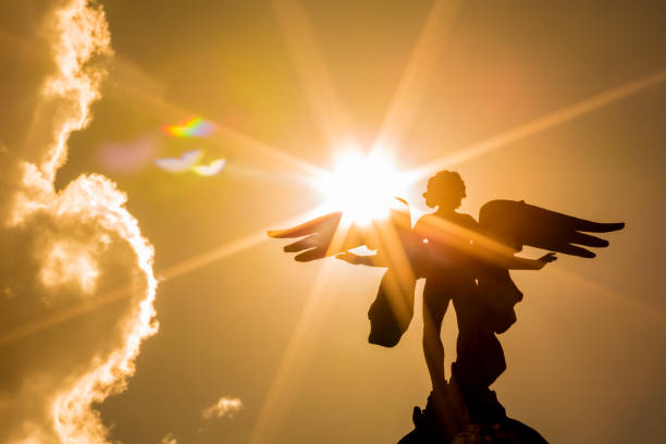 Angel with sunbeams Angel with sunbeams bronze statue stock pictures, royalty-free photos & images