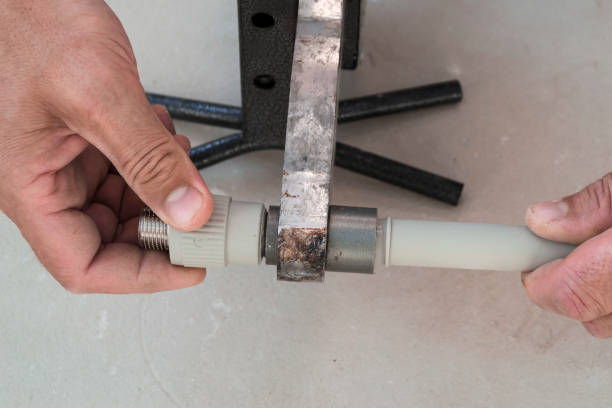 istock Installation of steam heating. Soldering polypropylene pipes closeup. 1168038672