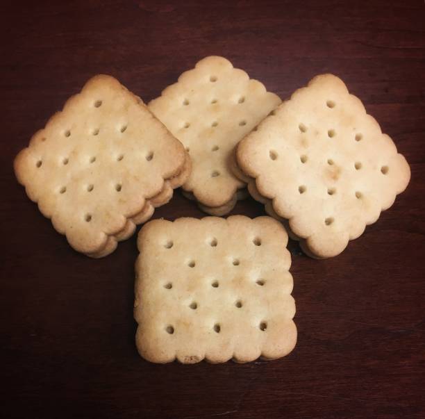 four peanut butter sandwich cookies as a snack - close up cookie gourmet food imagens e fotografias de stock