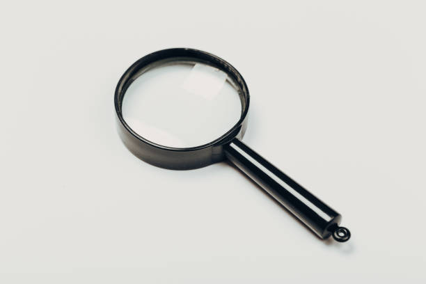 Small Magnifying Glass On Light Background Search Symbol Stock Photo -  Download Image Now - iStock