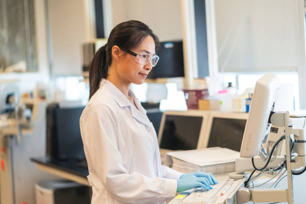 istock Female scientist using chemistry analyzer to get results from scientific sample 1168042031