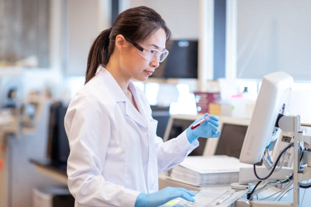 istock Female scientist using chemistry analyzer to get results from scientific sample 1168042044