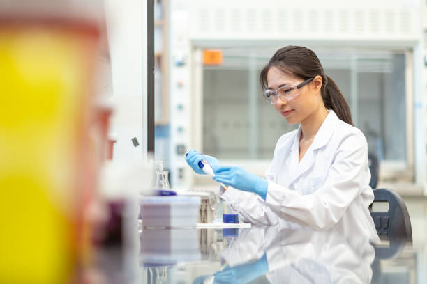 istock Female scientist pipetting in laboratory 1168042049