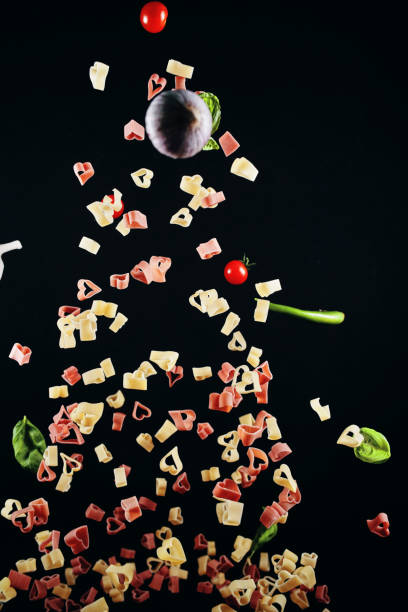 istock Heart Shaped Macaroni Pasta Food Explosion 1168042265