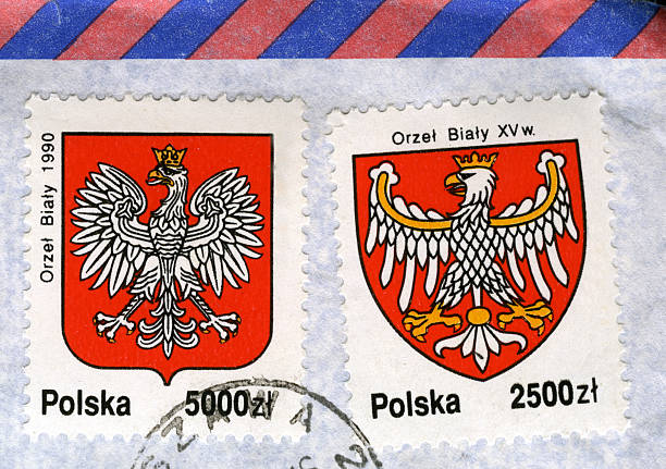 istock white eagle, national emblem of Poland, on old post stamps 116804269