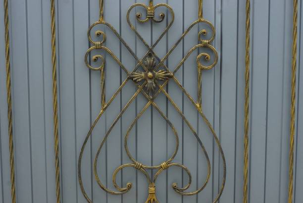 istock wrought iron metal texture on gray iron wall 1168045813