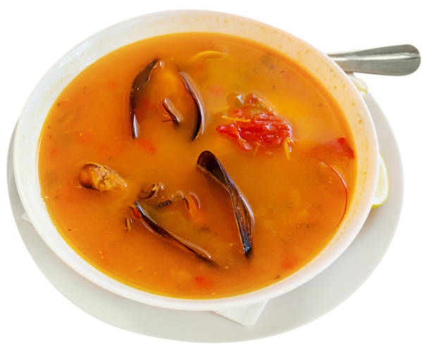 istock Spicy seafood soup with king prawns; shellfish and octopus 1168053006