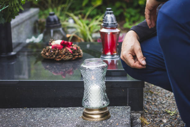 istock Silent memory at cemetery for dead person. 1168053719