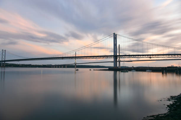 istock Suspension bridges at twilight 1168055556