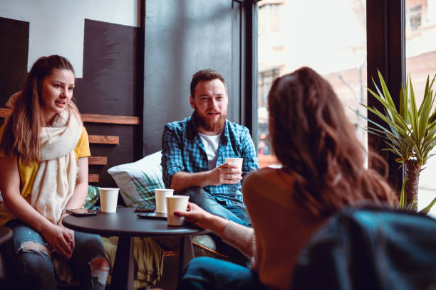 istock Friends Enjoying Coffee Together 1168055772