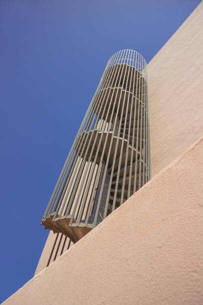 istock spiral staircase fire escape outside hotel 1168061626