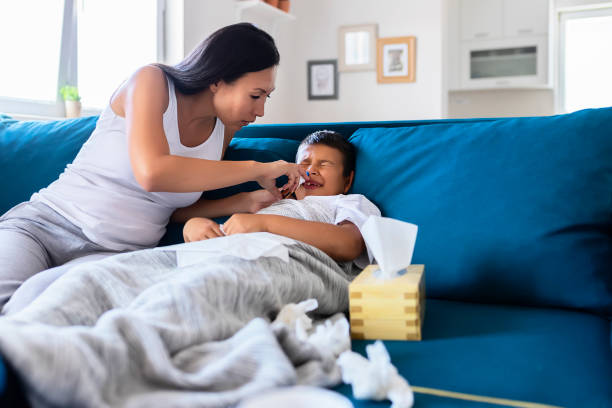 istock Mother and Her Sick Son 1168062803