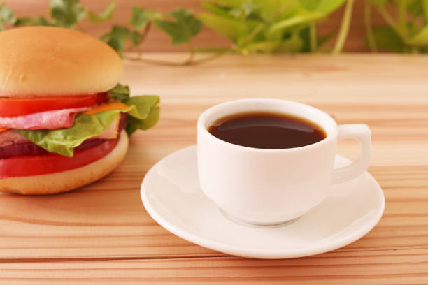 istock Tasty hamburger and a cup of coffee 1168063013