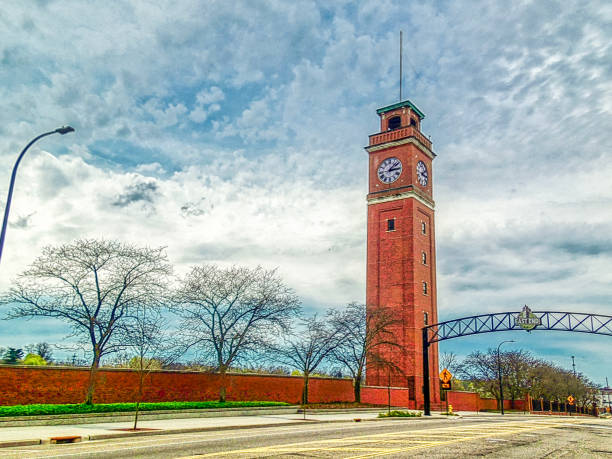 Where East Meets West... Akron, Ohio's East side and West side meet at the old Goodyear Tire & Rubber Company clock tower. akron ohio stock pictures, royalty-free photos & images