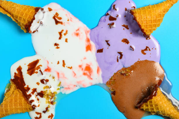 istock top view mini ice cream cones melted completely on a blue background 1168072240