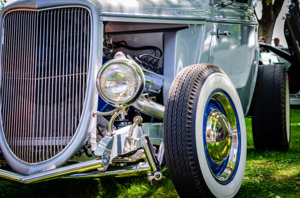 Close-up view of an open wheel blue hot rod with exposed engine Close-up view of an open wheel blue hot rod with exposed engine cruising hot rods stock pictures, royalty-free photos & images