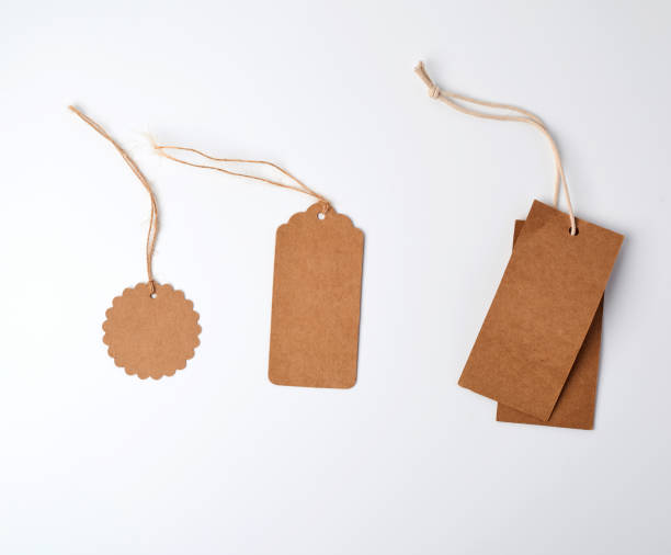 istock round and rectangular brown paper price tags hanging on a rope 1168077158