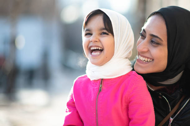 istock Smiling mother and daughter 1168079248