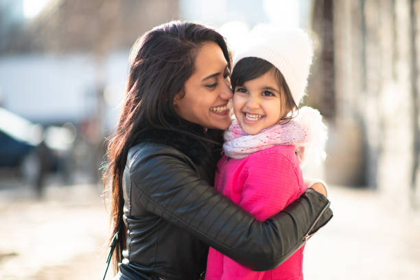 istock Smiling Muslim mother and child 1168079250