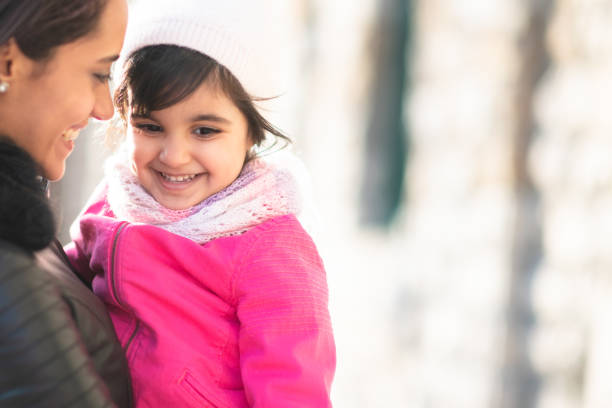 istock Smiling Muslim mother and child 1168079255