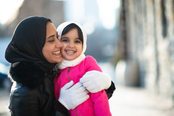 istock Smiling Muslim mother and child 1168079257