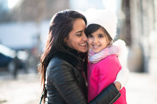 istock Smiling Muslim mother and child 1168079268