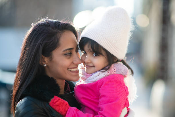 istock Smiling Muslim mother and child 1168079272