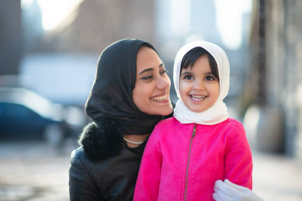 istock Smiling Muslim mother and child 1168079274