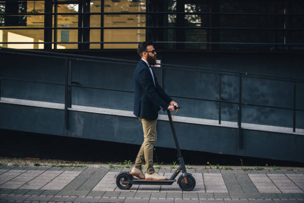 istock Hipster businessman taking an electric scooter to work 1168079295