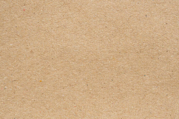 istock Old brown recycle cardboard paper texture background 1168079322