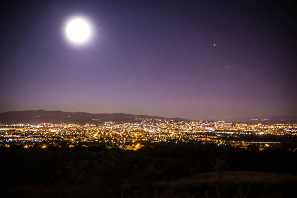 istock Panoramic View of city by night 1168084414