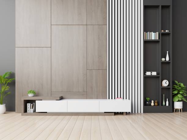 istock Tv cabinet in modern empty room with wooden wall background. 1168087334