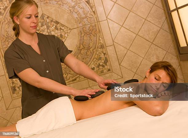 Pretty Woman Getting A Massage Stock Photo - Download Image Now - Adult, Adults Only, Alternative Therapy