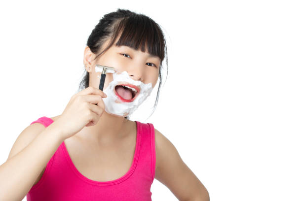 istock Chinese woman  shaving isolated on a white background 1168099000