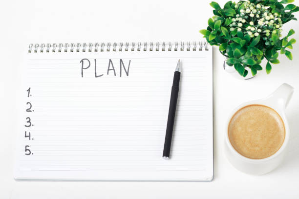 istock Inscription Plan in notepad, close-up, top view, concept of planning, goal setting 1168103147