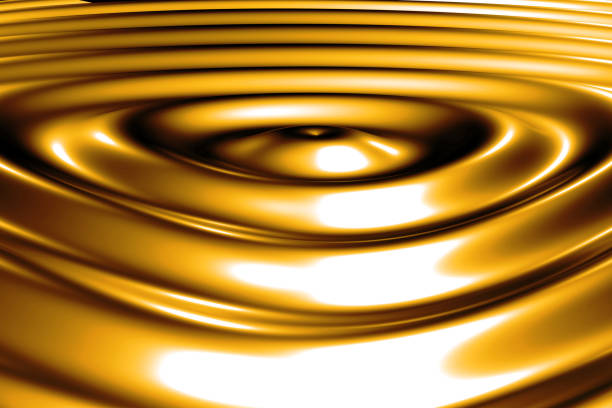 istock Liquid gold drop and ripple ,abstract background 1168109581