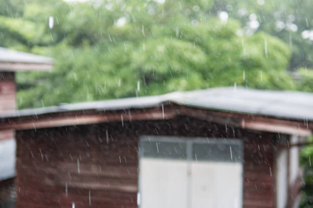 Heavy rain on wood cottage