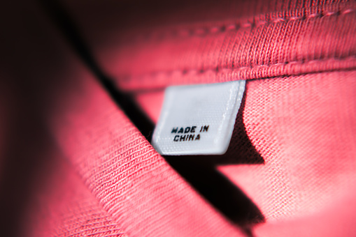 The Made in China label on red t-shirt